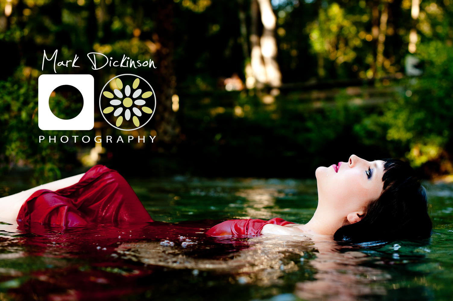 Mark Dickinson Photography | Girl with red dress in river floating
