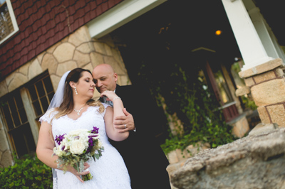 bride and groom holding each other